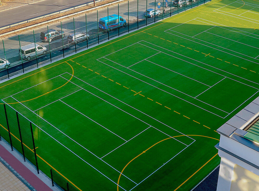 Outdoor football with artificial turf and lighting